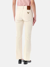 Valentino Garavani flared denim jeans - | Spazio Pritelli