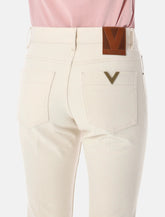 Valentino Garavani flared denim jeans - | Spazio Pritelli