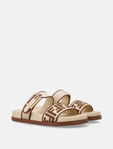 Fendi Feel raffia-effect slides - | Spazio Pritelli