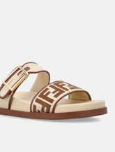 Fendi Feel raffia-effect slides - | Spazio Pritelli