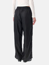 Pantaloni sportivi T7 neri di PUMA x ROSÉ - | Spazio Pritelli