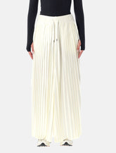 Nike Sportswear satin pleated mid-rise track pants - | Spazio Pritelli