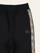 Burberry cotton jogging trousers with Check trims for kids - | Spazio Pritelli