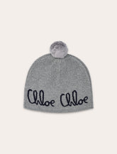 Chloé kids’ knitted beanie in organic cotton and wool with pompom - | Spazio Pritelli