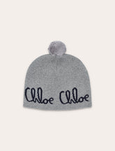 Chloé kids’ knitted beanie in organic cotton and wool with pompom - | Spazio Pritelli