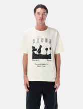 T-shirt in cotone con stampa grafica Thousand Palms Rhude - | Spazio Pritelli