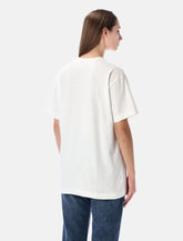 T-shirt bianca con cuore e cristalli di Comme des Garçons Play - | Spazio Pritelli