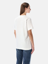 T-shirt bianca con cuore rosso e borchie di Comme des Garçons Play - | Spazio Pritelli