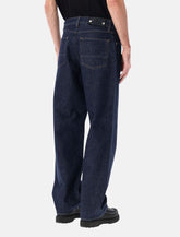 Jeans loose in denim indigo rinsed di Stone Island - | Spazio Pritelli