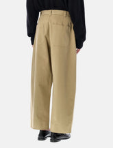 Studio Nicholson wide-leg peached cotton Sorte trousers - | Spazio Pritelli