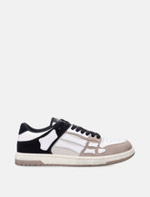 Amiri Skel Top low distressed leather sneakers - | Spazio Pritelli