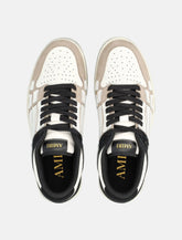 Amiri Skel Top low distressed leather sneakers - | Spazio Pritelli