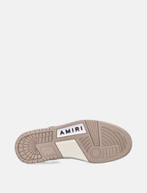 Amiri Skel Top low distressed leather sneakers - | Spazio Pritelli