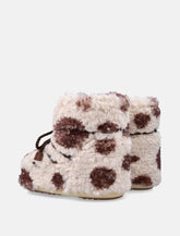 Moon Boot Icon Low Curly Brown Cow Print - | Spazio Pritelli