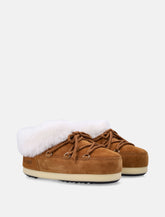 Moon Boot EVX suede mules with sheepskin trim - | Spazio Pritelli