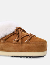Moon Boot EVX suede mules with sheepskin trim - | Spazio Pritelli