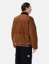 Sacai x Carhartt WIP washed duck down puffer jacket - | Spazio Pritelli