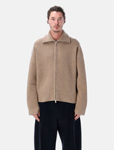 Cardigan con zip Sandos in lana merino di Studio Nicholson - | Spazio Pritelli