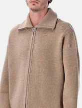 Cardigan con zip Sandos in lana merino di Studio Nicholson - | Spazio Pritelli
