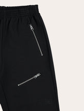 MM6 Maison Margiela Kids black jogger trousers with zips - | Spazio Pritelli