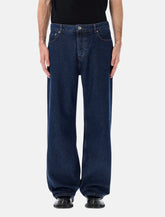 AMI Paris large fit raw indigo denim jeans - | Spazio Pritelli