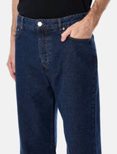 AMI Paris large fit raw indigo denim jeans - | Spazio Pritelli