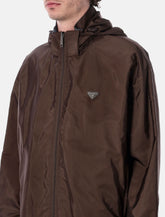 Prada Re-Nylon reversible jacket in brown and grey - | Spazio Pritelli