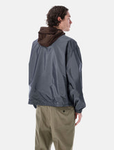 Prada Re-Nylon reversible jacket in brown and grey - | Spazio Pritelli