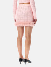 Gonna corta in maglia rosa con orlo in eco pelliccia di Self-Portrait -  | Spazio Pritelli