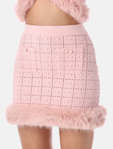 Gonna corta in maglia rosa con orlo in eco pelliccia di Self-Portrait -  | Spazio Pritelli