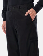 Stone Island Ghost weatherproof cotton canvas chino trousers -  | Spazio Pritelli