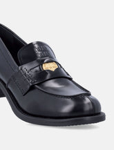 Mocassini neri Miu Miu in pelle spazzolata - | Spazio Pritelli