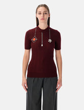 Maglia in lana bordeaux con pendenti gioiello di Prada - | Spazio Pritelli