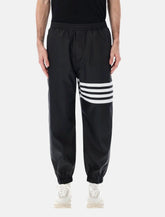 Pantaloni track neri con 4-Bar di Thom Browne - | Spazio Pritelli
