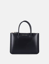 Borsa portafoglio Comme des Garçons Wallet in pelle con manici - | Spazio Pritelli