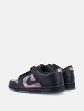 Nike Dunk Low sneakers in black leather with Pink Rise accents - | Spazio Pritelli