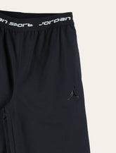 Nike Jordan Perform Sport kids’ woven pants - | Spazio Pritelli