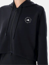 Felpa cropped con cappuccio nera di Adidas by Stella McCartney - | Spazio Pritelli