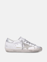 Sneakers Golden Goose Super-Star in pelle bianca e argento da donna - | Spazio Pritelli