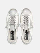 Sneakers Golden Goose Super-Star in pelle bianca e argento da donna - | Spazio Pritelli