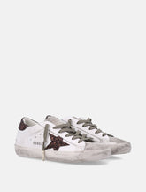 Sneakers da donna Super-Star Golden Goose con stella glitter - | Spazio Pritelli