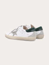 Golden Goose kids Old School white leather and dark-green sneakers - | Spazio Pritelli