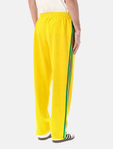 Adidas Originals yellow Firebird track pants - | Spazio Pritelli