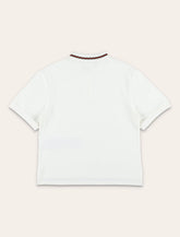 Polo da bambina Gucci in cotone piqué con dettaglio Web - | Spazio Pritelli