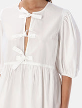 Ganni white cotton poplin mini dress with bows - | Spazio Pritelli