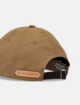 Cappello da baseball in cotone cerato JW Anderson - | Spazio Pritelli