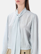 Blusa in seta con fiocco Prada - | Spazio Pritelli