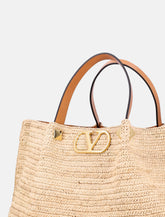 Valentino Garavani woman's small raffia shopping bag - | Spazio Pritelli