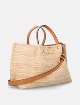 Valentino Garavani woman's small raffia shopping bag - | Spazio Pritelli