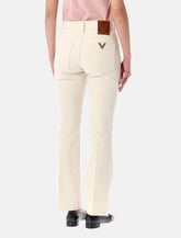 Valentino Garavani flared denim jeans - | Spazio Pritelli